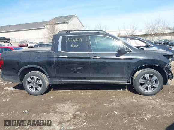2019 Honda Ridgeline RTL-E with VIN 5FPYK3F7XKB014406, listed as a IAAI auction lot 41765154 with 65,209 mi miles and . Bid and sale history available at DreamBid. Image 14.