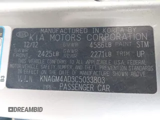 2012 Kia Optima Hybrid with VIN KNAGM4AD3C5033803, listed as a IAAI auction lot 42068386 with 115,442 mi miles. Bid and sale history available at carsss.com. Image 9.