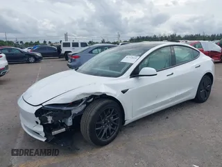 2025 Tesla Model 3 Long Range with VIN 5YJ3E1EA0SF932385, listed as a IAAI auction lot 41772613 with 1,683 mi miles and . Bid and sale history available at carsss.com. Image 17.