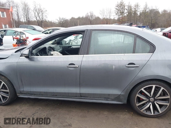 2012 Volkswagen Jetta GLI Autobahn with VIN 3VW5A7AJ5CM410777, listed as a IAAI auction lot 41729287 with 116,427 mi miles and . Bid and sale history available at DreamBid. Image 14.