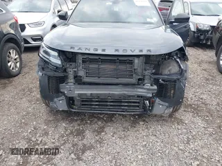 2025 Land Rover Range Rover Velar Dynamic SE with VIN SALYL2EX9SA809479, listed as a IAAI auction lot 42150495 with 7,038 mi miles and . Bid and sale history available at DreamBid. Image 6.