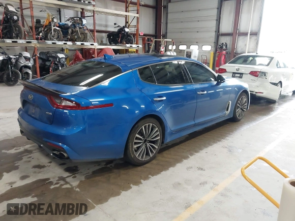 2018 Kia Stinger Premium with VIN KNAE25LA5J6017132, listed as a IAAI auction lot 42163195 with 176,947 mi miles. Bid and sale history available at carsss.com. Image 4.