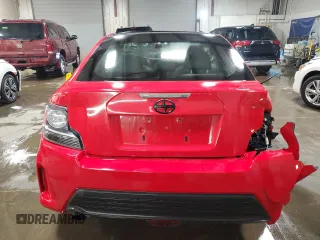 2014 Scion tC z VIN JTKJF5C71E3072025, wystawiony jako Copart lot #51967285 z przebiegiem 187 091 mil mil oraz Szkody całkowita. Historia ofert i sprzedaży dostępna na DreamBid. Obrazek 6.