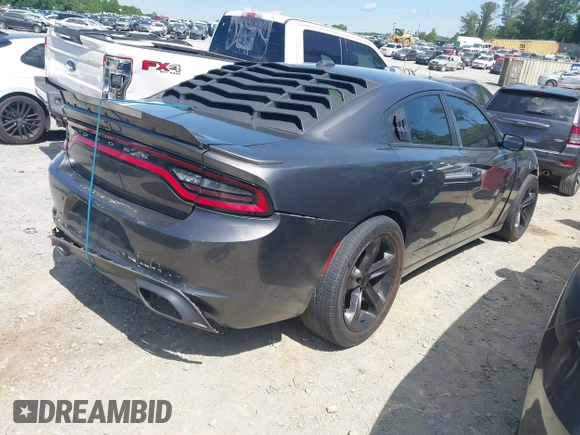 2018 Dodge Charger Daytona z VIN 2C3CDXCT4JH261021, wystawiony jako IAAI lot #42188904 z przebiegiem 79 652 mil mil oraz . Historia ofert i sprzedaży dostępna na DreamBid. Obrazek 4.