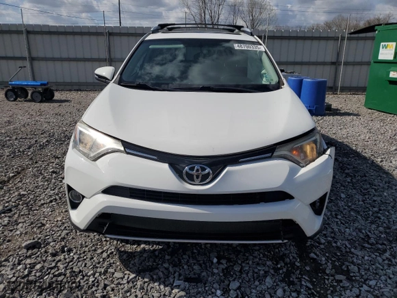 2016 Toyota RAV4 XLE with VIN 2T3WFREV3GW263574, listed as a Copart auction lot 48700335 with 61,103 mi miles and Salvage Title. Bid and sale history available at carsss.com. Image 5.
