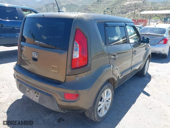 2012 Kia Soul + with VIN KNDJT2A65C7454931, listed as a IAAI auction lot 41963654 with 353,649 mi miles. Bid and sale history available at carsss.com. Image 4.
