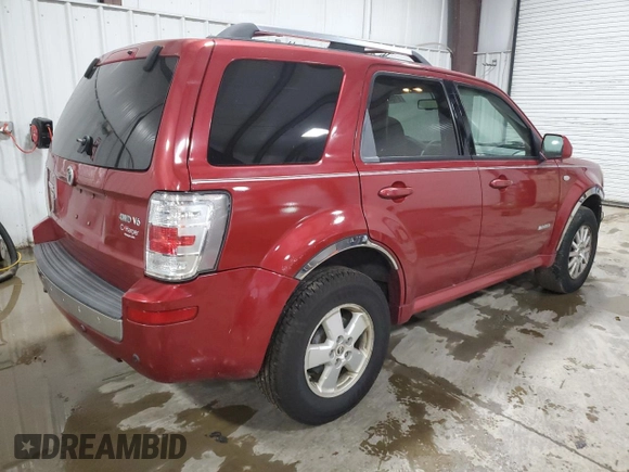 2008 Mercury Mariner Premier z VIN 4M2CU97118KJ52951, wystawiony jako Copart lot #61640225 z przebiegiem 186 109 mil mil oraz Szkoda całkowita • Salvage title. Historia ofert i sprzedaży dostępna na DreamBid. Obrazek 3.