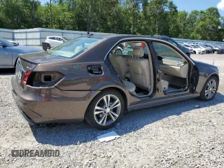 2014 Mercedes-Benz E 350 Luxury with VIN WDDHF8JB5EB004904, listed as a Copart auction lot 56923425 with 135,459 mi miles and Salvage title. Bid and sale history available at DreamBid. Image 3.
