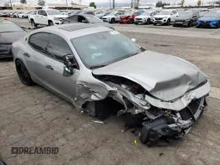 2017 Maserati Ghibli S с VIN ZAM57RSAXH1220971, выставлен на аукционе Copart как лот 45923875 с пробегом Не указан миль и Чистый • Clean title. История ставок и продаж доступна на DreamBid. Изображение 4.