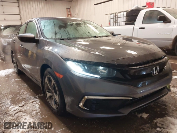 2020 Honda Civic LX z VIN 19XFC2F65LE030888, wystawiony jako IAAI lot #41609630 z przebiegiem 115 614 mil mil oraz . Historia ofert i sprzedaży dostępna na DreamBid. Obrazek 1.