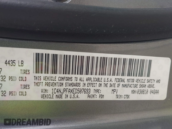 2014 Jeep Patriot Latitude with VIN 1C4NJPFAXED507693, listed as a IAAI auction lot 41701193 with 104,130 mi miles and . Bid and sale history available at DreamBid. Image 9.
