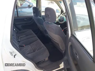 1999 Honda CR-V EX with VIN JHLRD1860XC037846, listed as a IAAI auction lot 42037921 with 164,477 mi miles. Bid and sale history available at carsss.com. Image 8.
