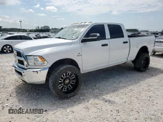 2017 Ram 2500 Tradesman z VIN 3C6UR5CL0HG673735, wystawiony jako Copart lot #57064865 z przebiegiem 103 068 mil mil oraz Szkoda całkowita • Salvage title. Historia ofert i sprzedaży dostępna na DreamBid. Obrazek 1.