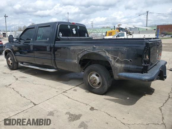 2001 Ford F-350 XL with VIN 1FTWW32F01EA68170, listed as a Copart auction lot 53516435 with 302,516 mi miles and Salvage title. Bid and sale history available at DreamBid. Image 2.