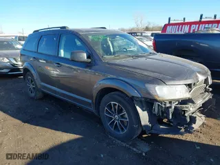 2018 Dodge Journey SE with VIN 3C4PDCAB5JT274576, listed as a IAAI auction lot 41680697 with 121,451 mi miles. Bid and sale history available at carsss.com. Image 1.