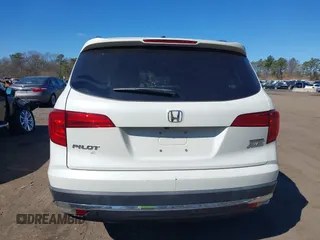 2017 Honda Pilot Touring z VIN 5FNYF6H99HB089121, wystawiony jako IAAI lot #41896878 z przebiegiem 145 330 mil mil oraz . Historia ofert i sprzedaży dostępna na DreamBid. Obrazek 16.