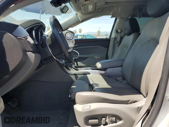 2012 Cadillac SRX Luxury Collection with VIN 3GYFNAE36CS653119, listed as a Copart auction lot 53866715 with 69,997 mi miles and Salvage Title. Bid and sale history available at DreamBid. Image 7.