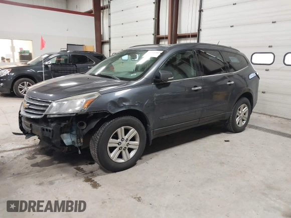 2013 Chevrolet Traverse LT with VIN 1GNKVJKD9DJ152592, listed as a IAAI auction lot 41143281 with 199,259 mi miles and . Bid and sale history available at DreamBid. Image 2.