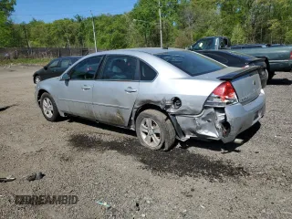 2013 Chevrolet Impala LS with VIN 2G1WF5E36D1233571, listed as a Copart auction lot 53624605 with 173,138 mi miles and Salvage Title. Bid and sale history available at DreamBid. Image 2.
