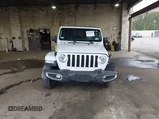 2018 Jeep Wrangler Unlimited Sahara with VIN 1C4HJXEG3JW116404, listed as a IAAI auction lot 42152506 with 57,727 mi miles and . Bid and sale history available at DreamBid. Image 12.