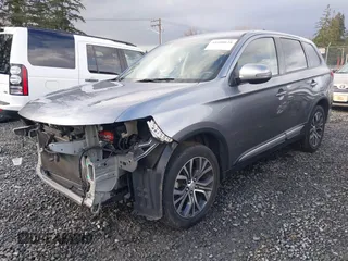 2017 Mitsubishi Outlander SE z VIN JA4AZ3A34HZ033833, wystawiony jako IAAI lot #41608628 z przebiegiem 80 382 mil mil oraz . Historia ofert i sprzedaży dostępna na DreamBid. Obrazek 2.