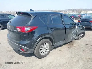 2016 Mazda CX-5 Sport with VIN JM3KE4BY3G0843177, listed as a IAAI auction lot 41804094 with 193,461 mi miles. Bid and sale history available at carsss.com. Image 4.