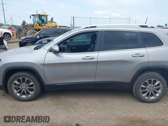 2021 Jeep Cherokee Altitude with VIN 1C4PJLLB2MD164004, listed as a IAAI auction lot 42083946 with 99,136 mi miles and . Bid and sale history available at DreamBid. Image 14.