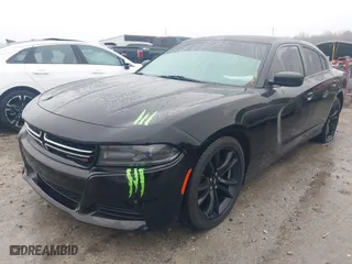 2015 Dodge Charger SE with VIN 2C3CDXBG6FH928733, listed as a IAAI auction lot 41556374 with NaN miles. Bid and sale history available at carsss.com. Image 18.