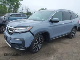 2022 Honda Pilot Touring 7-Passenger with VIN 5FNYF6H68NB056077, listed as a IAAI auction lot 42357338 with 18,193 mi miles and . Bid and sale history available at DreamBid. Image 17.