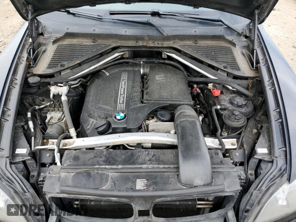 2012 BMW X5 35i with VIN 5UXZV4C50CL989832, listed as a Copart auction lot 62606485 with 157,025 mi miles and Clean title. Bid and sale history available at DreamBid. Image 12.