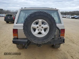 1993 Jeep Cherokee Sport with VIN 1J4FJ67S6PL580133, listed as a Copart auction lot 43230005 with 122,173 mi miles and Salvage Title. Bid and sale history available at carsss.com. Image 6.