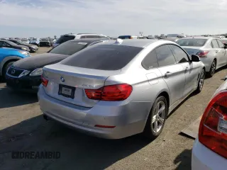 2015 BMW 4 Series 428i xDrive with VIN WBA4C9C52FG135501, listed as a Copart auction lot 51219774 with 104,333 mi miles and Salvage Title. Bid and sale history available at DreamBid. Image 3.