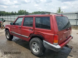 1999 Jeep Cherokee Sport with VIN 1J4FT68SXXL669549, listed as a Copart auction lot 62367015 with 194,446 mi miles and Salvage title. Bid and sale history available at DreamBid. Image 2.