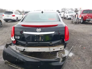 2015 Cadillac XTS Luxury with VIN 2G61M5S38F9138545, listed as a IAAI auction lot 41690696 with 136,460 mi miles and . Bid and sale history available at DreamBid. Image 16.