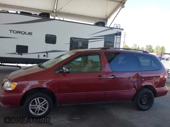 2002 Toyota Sienna LE with VIN 4T3ZF13C02U473719, listed as a IAAI auction lot 42272685 with 301,288 mi miles and . Bid and sale history available at DreamBid. Image 14.