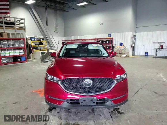 2018 Mazda CX-5 Touring z VIN JM3KFBCM5J0462676, wystawiony jako Copart lot #57892015 z przebiegiem 76 566 mil mil oraz Szkoda całkowita • Salvage title. Historia ofert i sprzedaży dostępna na DreamBid. Obrazek 14.