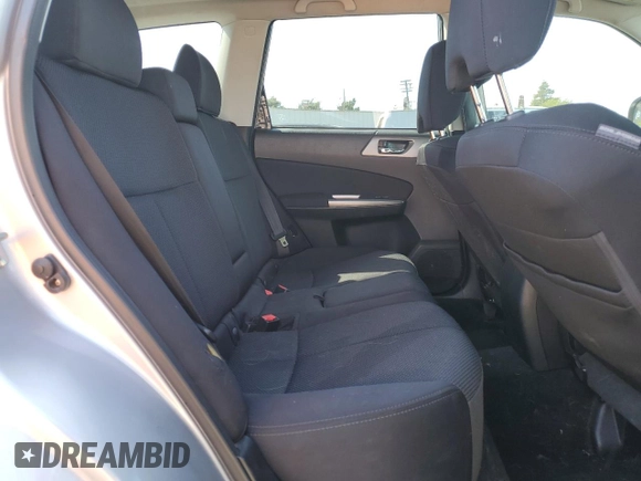 2012 Subaru Forester X Premium z VIN JF2SHADC7CH417098, wystawiony jako Copart lot #60042125 z przebiegiem 122 865 mil mil oraz Szkoda całkowita • Salvage title. Historia ofert i sprzedaży dostępna na DreamBid. Obrazek 11.