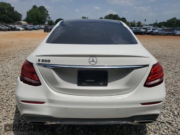 2019 Mercedes-Benz E 300 with VIN WDDZF4JB8KA645219, listed as a Copart auction lot 59702515 with 55,117 mi miles and Salvage title. Bid and sale history available at DreamBid. Image 6.
