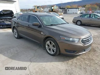 2015 Ford Taurus SEL with VIN 1FAHP2H87FG199865, listed as a IAAI auction lot 40760225 with 77,782 mi miles. Bid and sale history available at carsss.com. Image 1.