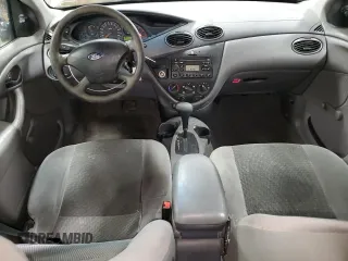 2003 Ford Focus LX z VIN 1FAFP33P03W313279, wystawiony jako Copart lot #89271495 z przebiegiem 152 672 mil mil oraz Szkoda całkowita • Salvage title. Historia ofert i sprzedaży dostępna na DreamBid. Obrazek 8.