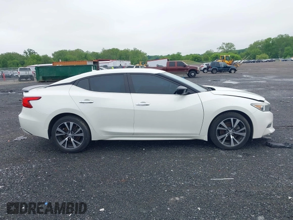 2016 Nissan Maxima SV z VIN 1N4AA6AP2GC375242, wystawiony jako IAAI lot #42220608 z przebiegiem 59 983 mil mil oraz . Historia ofert i sprzedaży dostępna na DreamBid. Obrazek 13.