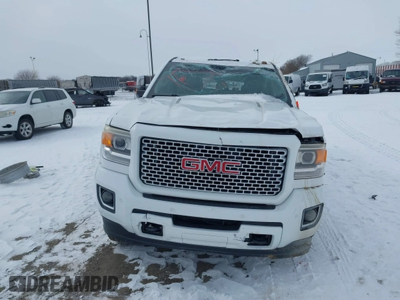 2015 GMC Sierra 2500HD available WiFi Denali with VIN 1GT120E88FF680538, listed as a IAAI auction lot 41571684 with 125,147 mi miles. Bid and sale history available at carsss.com. Image 12.