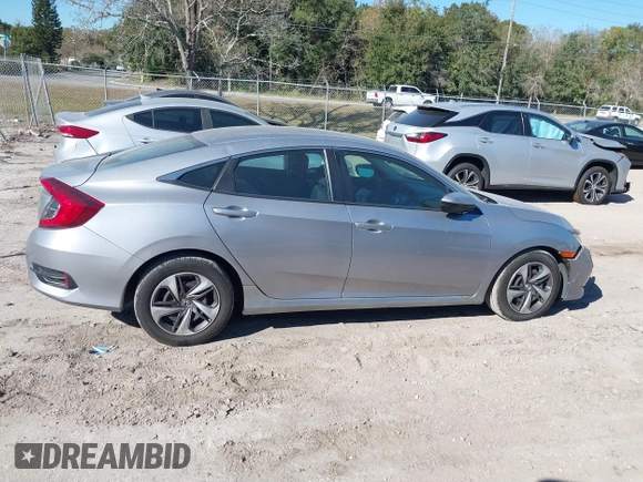 2020 Honda Civic LX with VIN 19XFC2F62LE009433, listed as a IAAI auction lot 40963670 with 117,865 mi miles and . Bid and sale history available at DreamBid. Image 13.