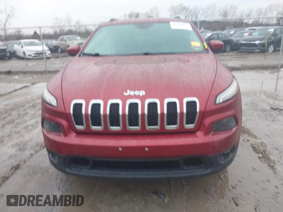 2015 Jeep Cherokee Latitude z VIN 1C4PJMCS1FW649201, wystawiony jako IAAI lot #41976056 z przebiegiem 74 991 mil mil oraz . Historia ofert i sprzedaży dostępna na DreamBid. Obrazek 12.