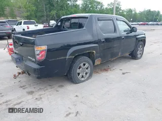 2007 Honda Ridgeline RTX z VIN 2HJYK16317H545839, wystawiony jako IAAI lot #42446190 z przebiegiem 183 600 mil mil oraz . Historia ofert i sprzedaży dostępna na DreamBid. Obrazek 4.