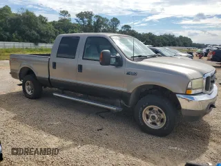 2004 Ford Super Duty F-250 XL with VIN 1FTNW21L74EA13894, listed as a Copart auction lot 73371924 with 177,417 mi miles and Clean Title. Bid and sale history available at carsss.com. Image 4.