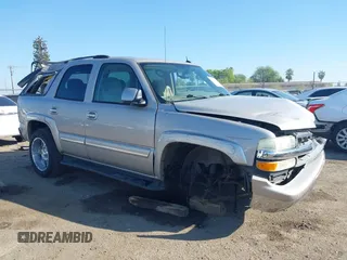 2004 Chevrolet Tahoe LS with VIN 1GNEC13T64J282970, listed as a IAAI auction lot 41879458 with 205,952 mi miles and . Bid and sale history available at DreamBid. Image 13.