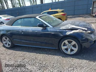 2016 Audi A5 Premium Plus with VIN WAUM2AFH2GN005516, listed as a IAAI auction lot 42181132 with 60,280 mi miles. Bid and sale history available at carsss.com. Image 13.