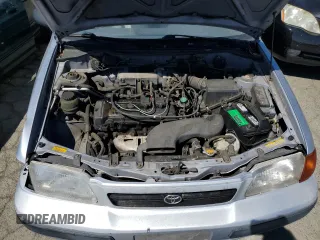 1995 Toyota Tercel DX z VIN JT2EL56E7S7011335, wystawiony jako Copart lot #67978774 z przebiegiem 182 025 mil mil oraz Szkoda całkowita • Salvage title. Historia ofert i sprzedaży dostępna na DreamBid. Obrazek 11.