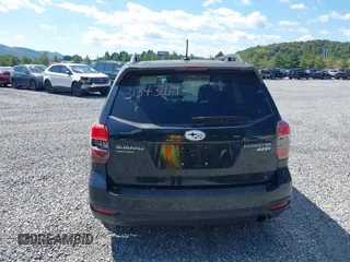 2014 Subaru Forester 2.5i Limited with VIN JF2SJAJC9EH517196, listed as a IAAI auction lot 31343919 with 71,396 mi miles. Bid and sale history available at carsss.com. Image 15.
